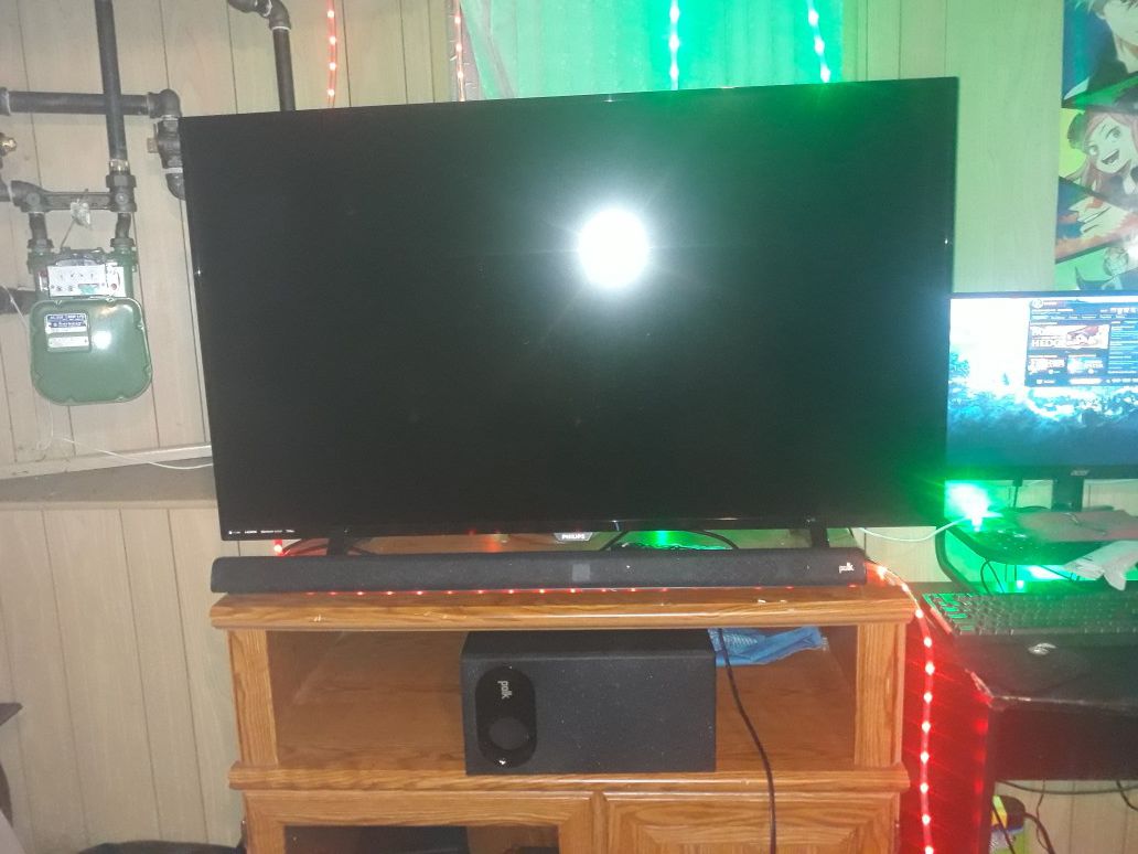 Phillip's 55 inch 4k tv with Polk sound bar and bass asking for $450 obo