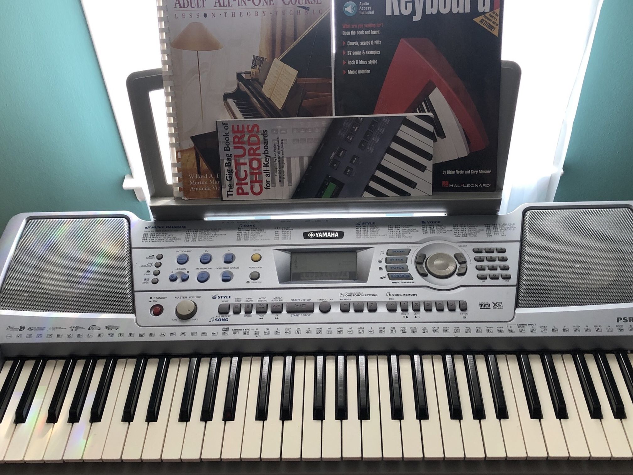 Grey Yamaha PSR-292 With Stand and Learning Books