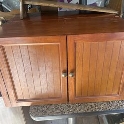 neat cabinet its 15 inches tall 26 inches wide and 11 inches deep