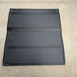 Bakflip MX4  Trifold Bed Cover For 5.7’ Ram Truck.  