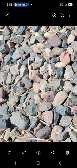 A pile of small size gravel rocks for sale asking best offer to load deliver ok it's great low price for 1 large pile small rocks decor