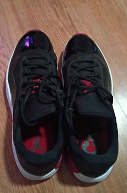Jordan 11s red and black