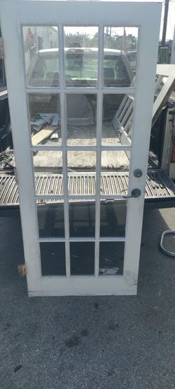 Exterior solid wood door non-impact glass approximately 33.75 by 77.25