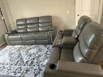 Gray Leather Reclining Sofa and Loveseat Set