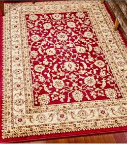 Like new smoke free pet free area rug 9X12
