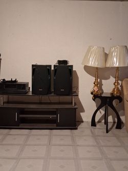 Two brass lamps with TV stand