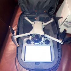 DJI Mini 3 Pro Camera Drone (with RC Remote and Sling Case)