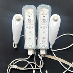 Nintendo Wii Remotes Official OEM With Nunchucks & Sleeves Lot Of 2