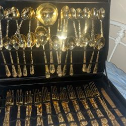 Em Roger’s and sons silverware set