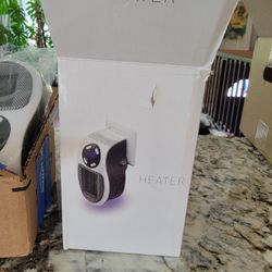 Compact Portable Plug-in Wall Heater For Small Indoor Spaces. 