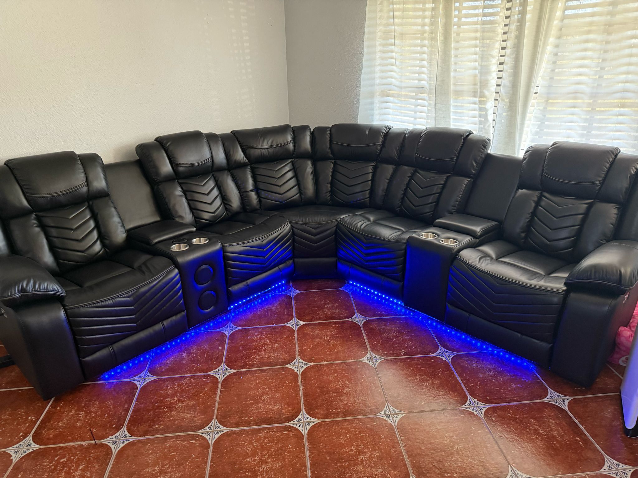 POWER RECLINING SECTIONAL WITH SPEAKERS, LED LIGHTS, USB PORTS , CUPHOLDERS AND ARM STORAGE