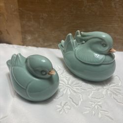 Japanese celadon-glazed mandarin duck figurines.