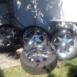 4 rims and tires 22 inches aluminium 3tires in a good shape one not one cup is missing