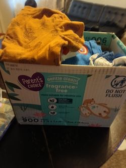Box of clothes size 24 months and 2t