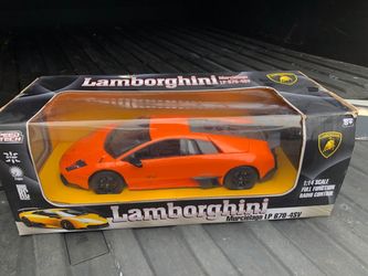 radio-controlled Lamborghini model . Remote du (move forward, back, turn right and left). Luminous headlights and detailed body of durable plastic