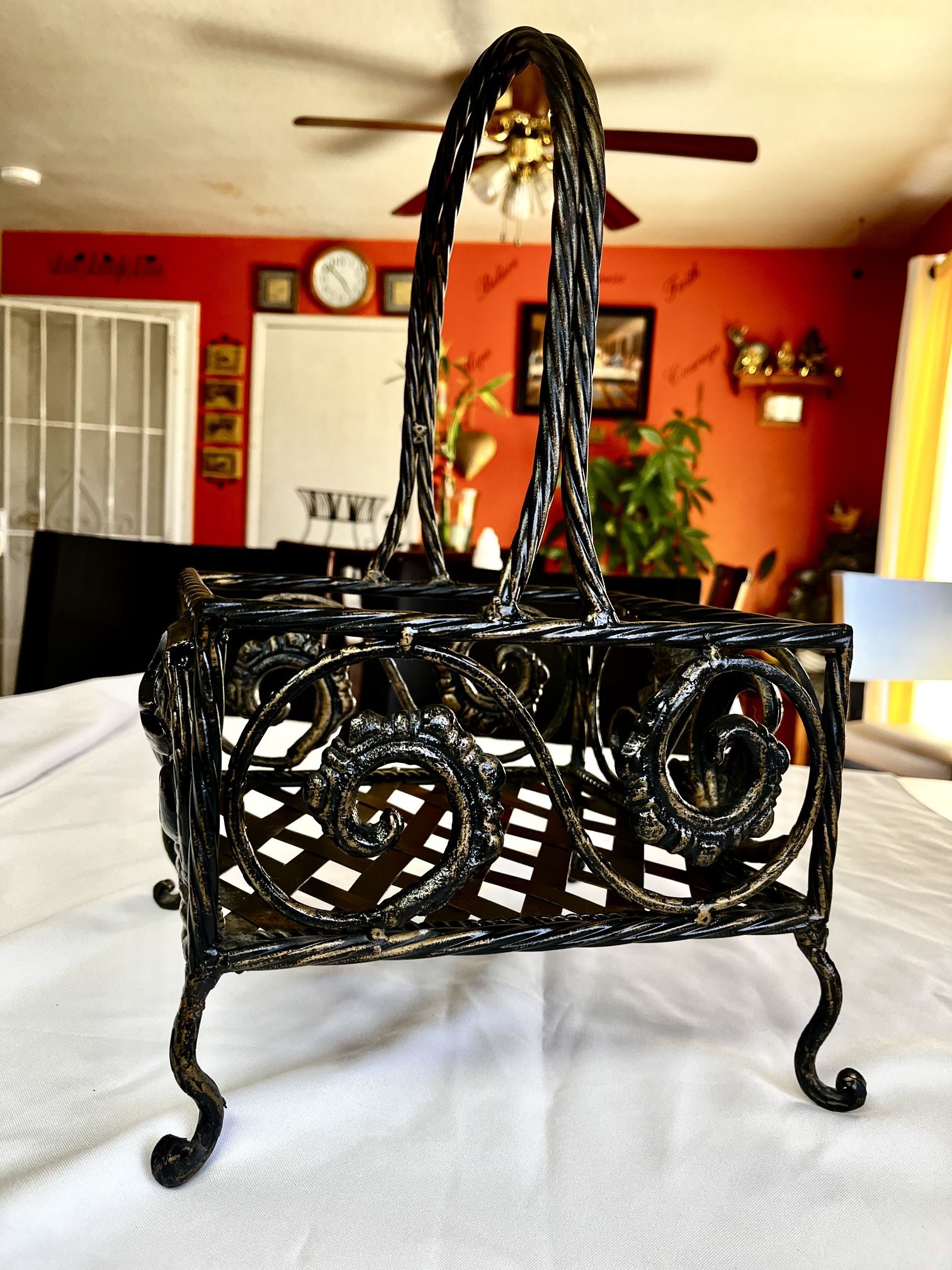WROUGHT IRON DECORATIVE BASKET .
