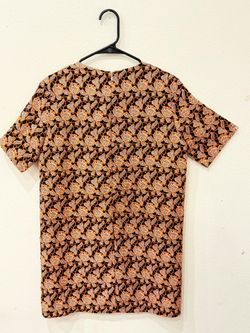 Orange,black, and white floral print dress