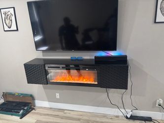 Wall mounted TV stand with fireplace