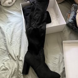 Black knee high boots
