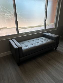 Gray leather chair with daybed
