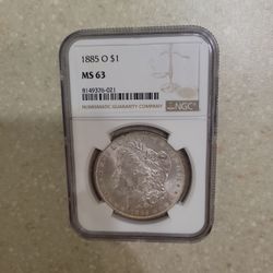 1885 O Morgan Silver Dollar.  Graded 