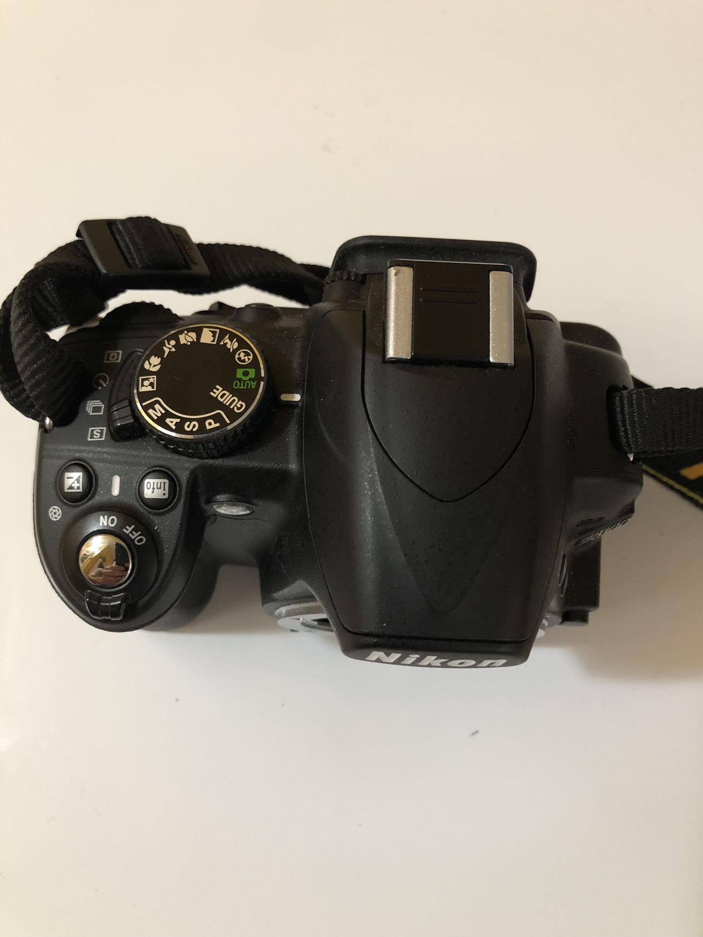 Nikon D3100 Camera In Good Condition . The cover to the SD card broke