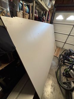 Two sheets of gray melamine (cabinet, shelves, etc.)