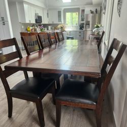 Dining Table for 8–10 People + 8 Chairs (Costco)