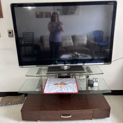 65” tv and glass top tv stand