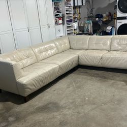 Beautiful cream leather Sofa. Well Used But Well Cared For. 