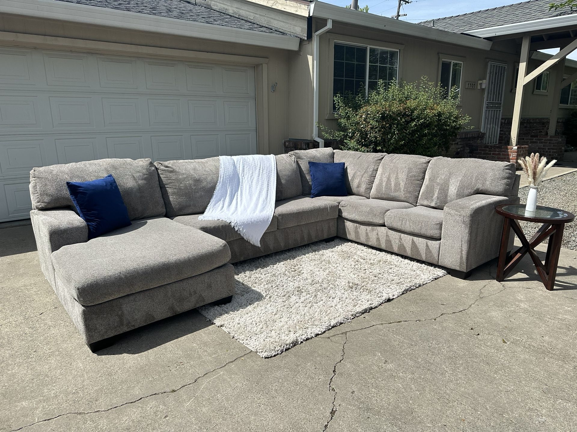 Free delivery Ashley Furniture gray U-shaped sectional couch retails $1600