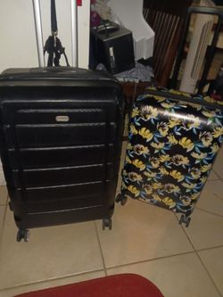 2 NICE HARD SHELL 4 WHEELS SPINNER LUGGAGES BLACK 1 IS 30IN FLOWER ETC CAL PAK 27IN ONLY 15 EACH FIRM