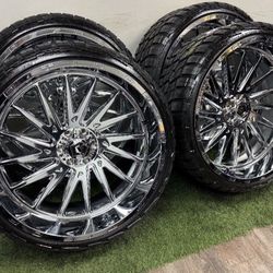 NEW 26x12 chrome tis wheels wrapped in 305/30r26 tires SAME AS A 33