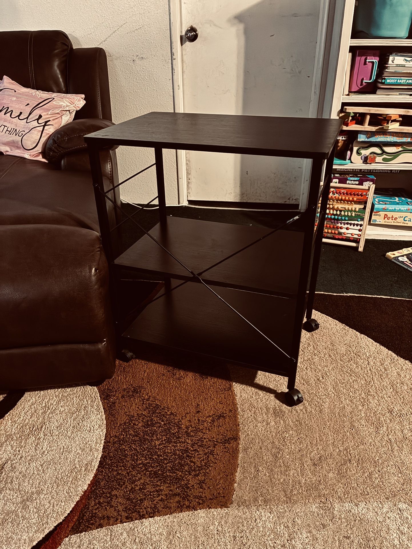 🤩💓🤩💓$50 Beautiful black microwave cart/table or storage shelf /stand. 2'5" tall X 2 ft wide X 1'4" deep. Nothing wrong with it at all. Just sellin