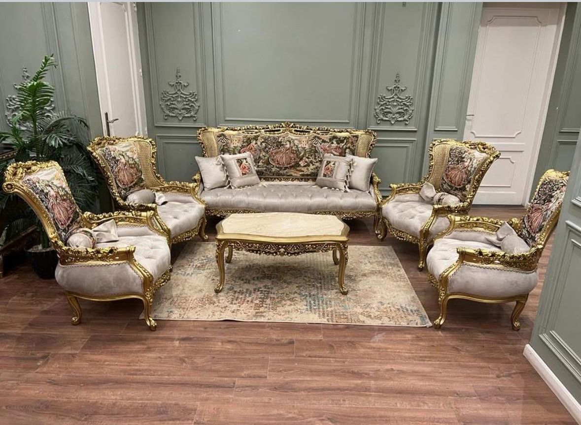  Reproduction Sofa Set LOOK UP A modern reproduction Italian-style carved wood and upholstered sofa set. TIME PERIOD Contemporary ORIGIN Italy (Reprod