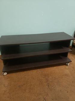 Perfect Condition Dark Wood TV Stand On Wheels 