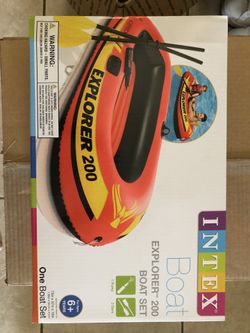 Brand new and unopened Intex rubber boat with pump and oars