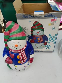 Ceramic snowman cookie jar .