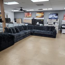 Huge 128 by 128 DARK GREY SECTIONAL WITH VIRAL FABRIC
