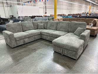 BRAND NEW 4 PIECE CONVERTIBLE SLEEPER SOFA