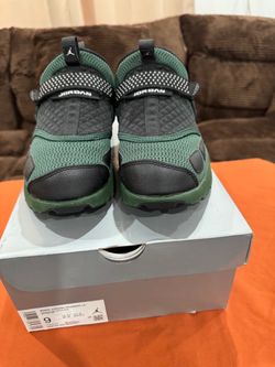 Jordan’s, black and green size 9 women sneakers