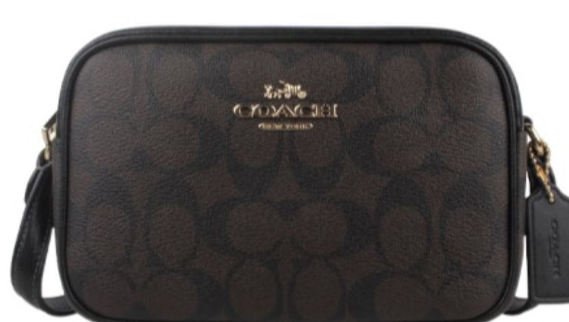 Black and brown Coach Cross body bag