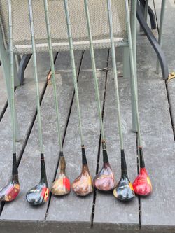 7 vintage wood head golf clubs