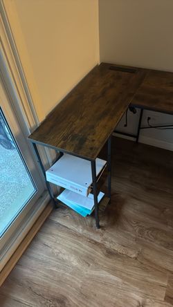 L-Shaped desk with surge protector