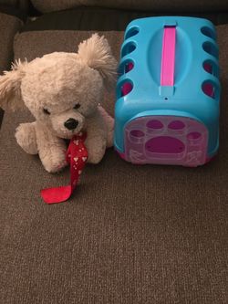 Stuffed Dog and Toy Dog Cage