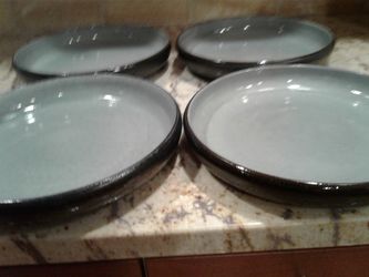 Set of 4 unique dinner plates. New