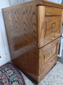 Oak 2 drawer file cabinets. Set of 2