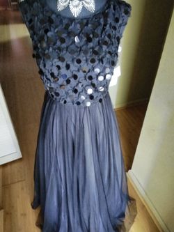 Black long evening dress. Sequin top