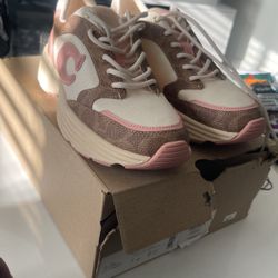 Pink And brown Coach