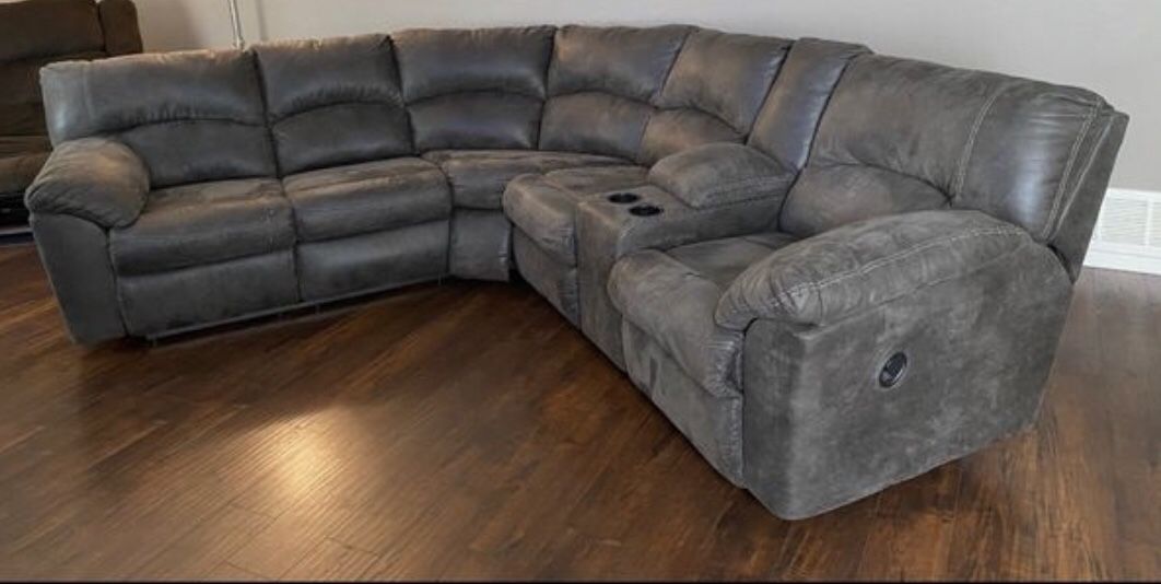 Check out this two piece sectional w/dual recliners!!